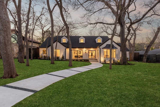 view of front of home featuring a yard