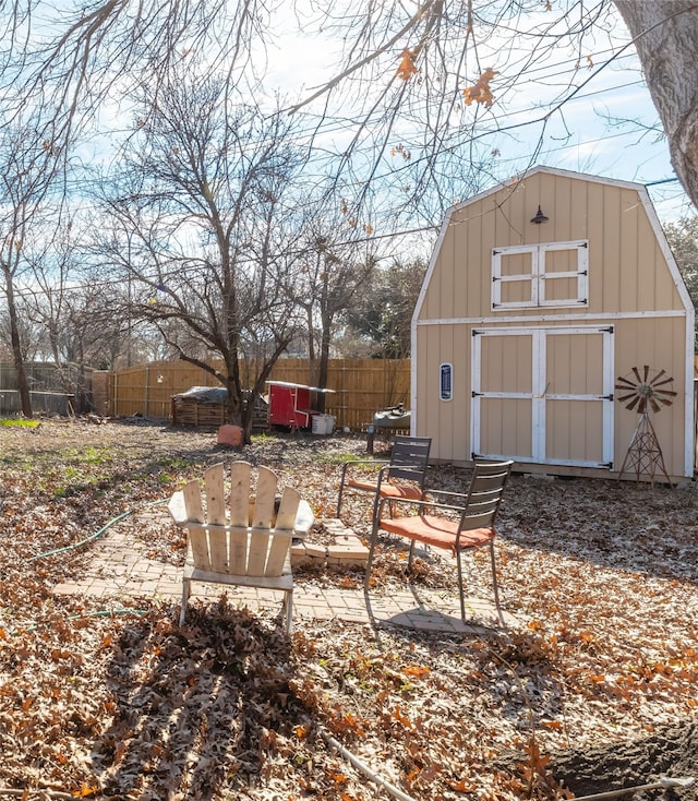 exterior space featuring a shed