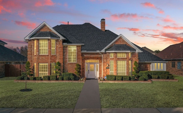 view of property with a lawn