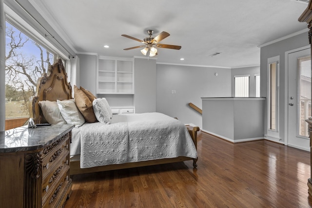 bedroom featuring dark wood-type flooring, ceiling fan, and ornamental molding