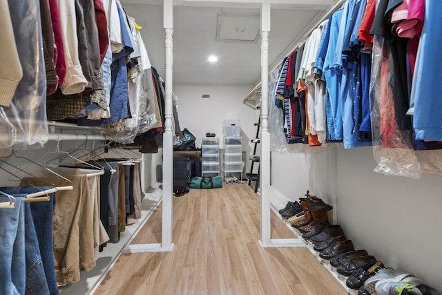 walk in closet featuring wood-type flooring