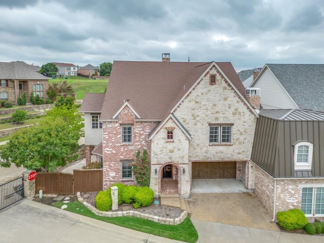 view of front of property featuring a garage