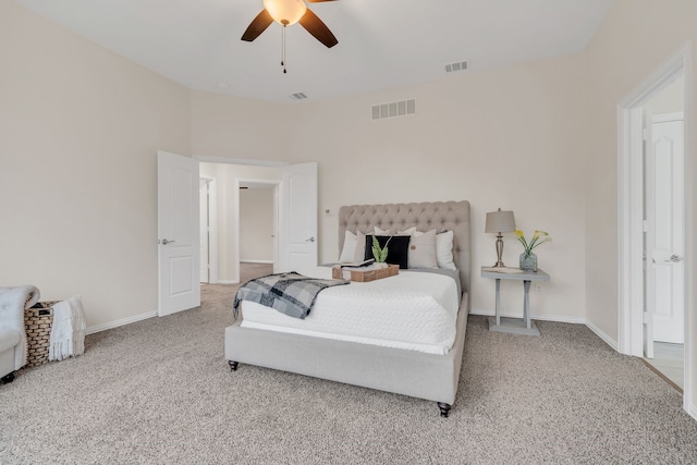 bedroom featuring light colored carpet and ceiling fan