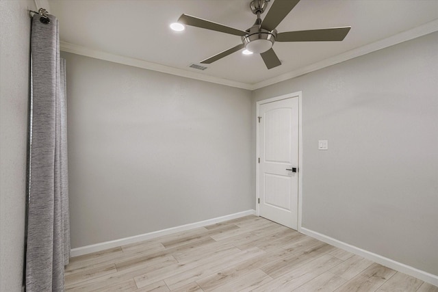 unfurnished room with crown molding, light hardwood / wood-style floors, and ceiling fan