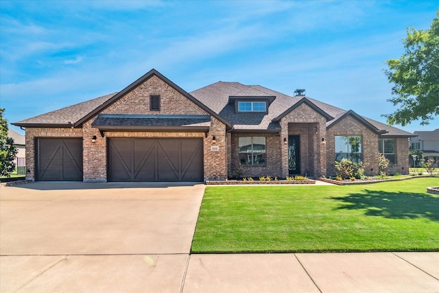 1616 Covered Brg, Gunter, TX 75058 - view of front facade featuring brick siding, an attached garage, a front yard, and roof with shingles