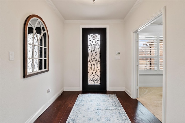 entrance foyer with ornamental molding and dark wood-type flooring