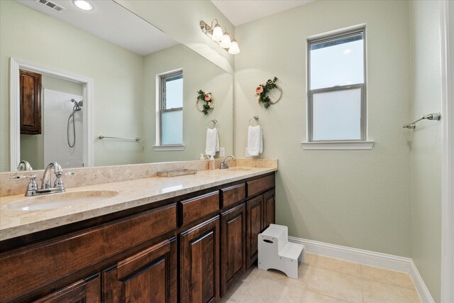 bathroom featuring vanity and tile patterned floors