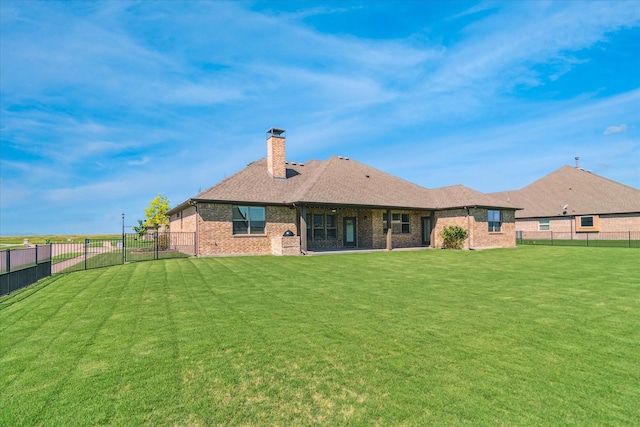1616 Covered Brg, Gunter, TX 75058 - rear view of property with a chimney and brick siding