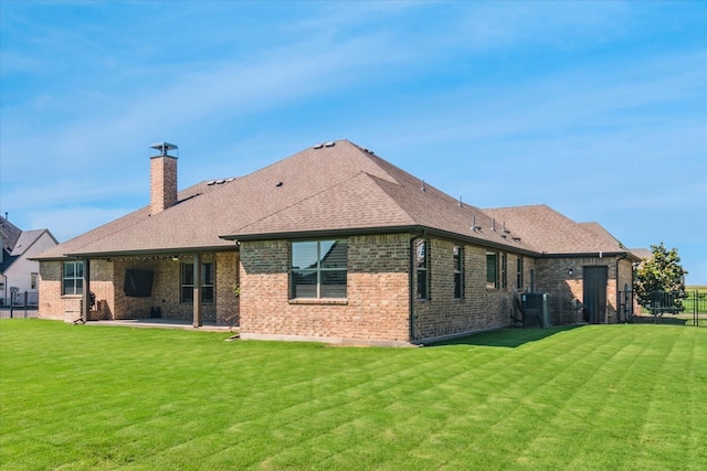 1616 Covered Brg, Gunter, TX 75058 - rear view of property with a chimney, brick siding, a patio, roof with shingles, and central air condition unit