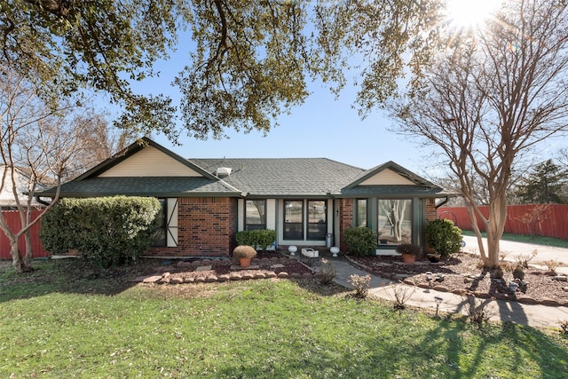 view of front facade with a front lawn