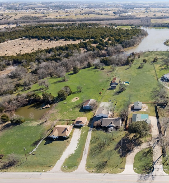 drone / aerial view featuring a water view and a rural view