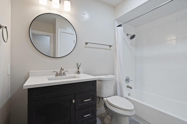 full bathroom featuring vanity, shower / bath combo with shower curtain, and toilet