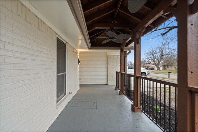 balcony with ceiling fan and covered porch