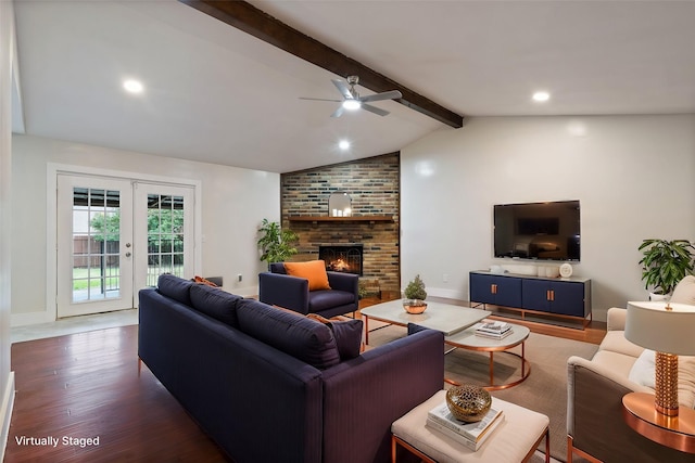 living area featuring french doors, dark wood-style flooring, a fireplace, lofted ceiling with beams, and baseboards