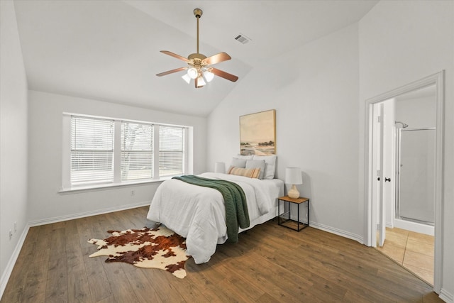 bedroom featuring hardwood / wood-style flooring, high vaulted ceiling, and ceiling fan