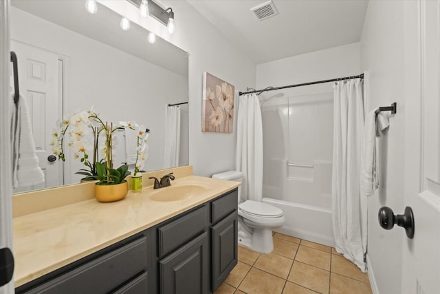 full bathroom featuring tile patterned flooring, vanity, toilet, and shower / bathtub combination with curtain