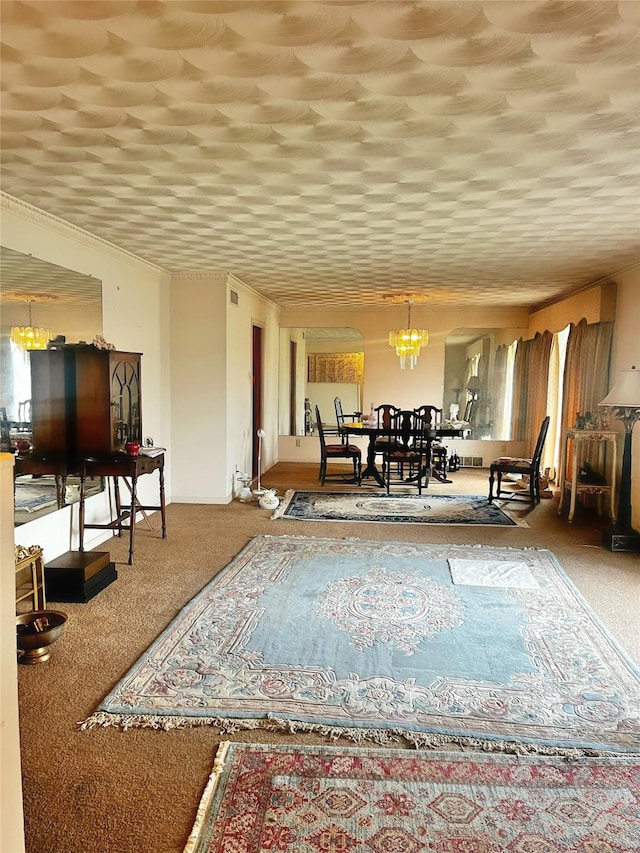 interior space with a notable chandelier and carpet floors