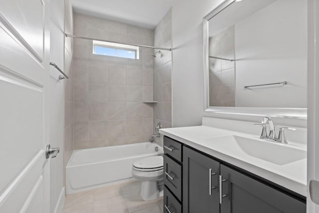 full bathroom with vanity, toilet, tiled shower / bath combo, and tile patterned flooring