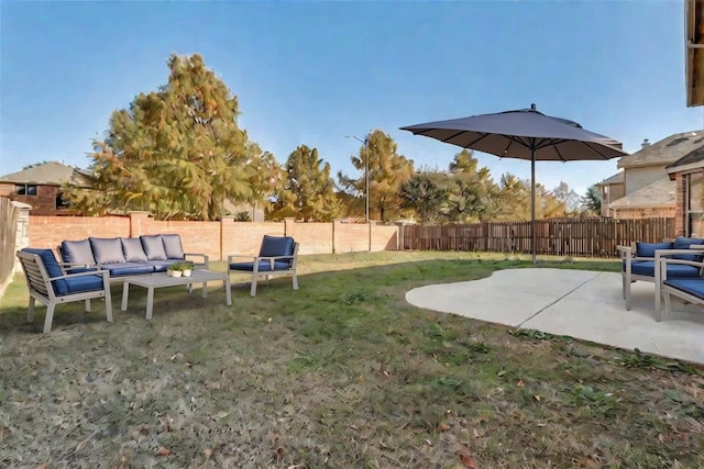 view of yard with a patio and an outdoor hangout area