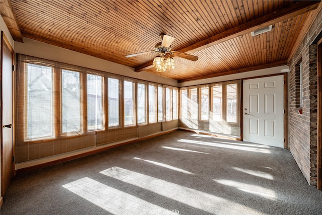 unfurnished sunroom featuring beam ceiling, wooden ceiling, and ceiling fan