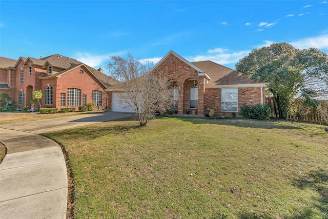 view of front property with a garage and a front lawn