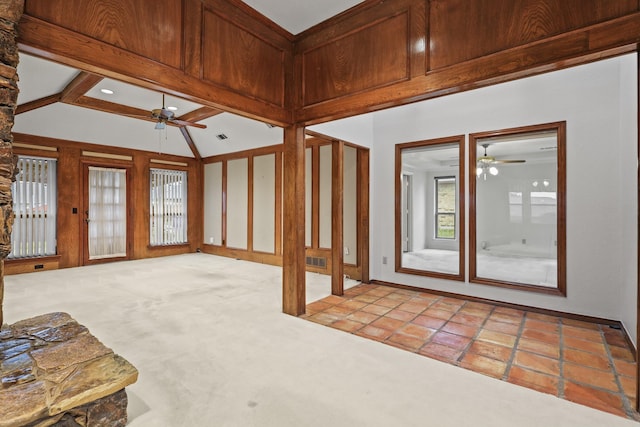 living room featuring ceiling fan, lofted ceiling with beams, and light carpet