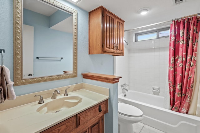 full bathroom featuring tile patterned floors, toilet, vanity, and shower / bath combo