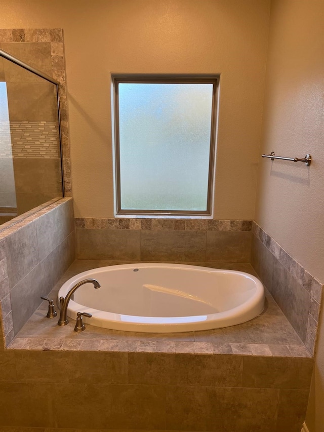 bathroom with plus walk in shower