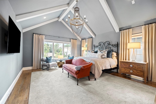 bedroom featuring beamed ceiling, wood-type flooring, a notable chandelier, and high vaulted ceiling