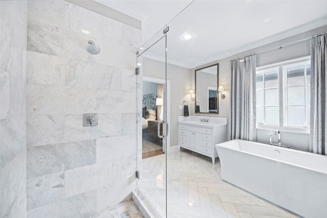 bathroom with ornamental molding, vanity, and plus walk in shower