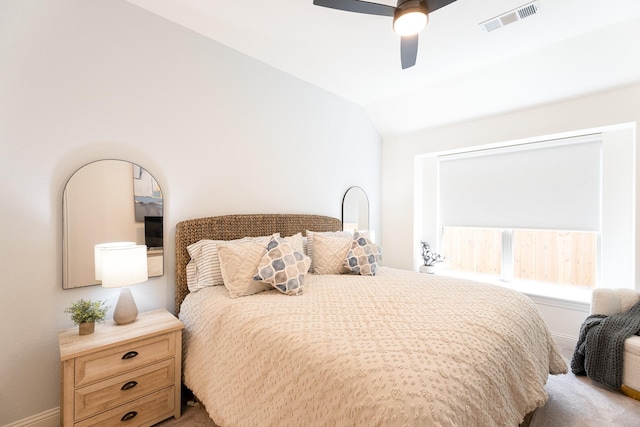 bedroom featuring lofted ceiling and ceiling fan