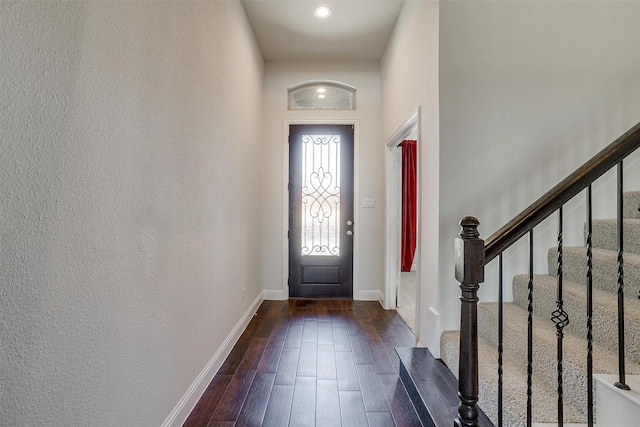 foyer featuring dark wood-type flooring