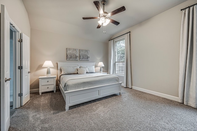 carpeted bedroom with lofted ceiling, baseboards, and ceiling fan