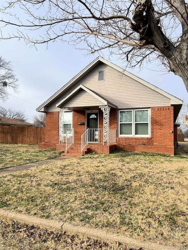 view of front of house with a front lawn