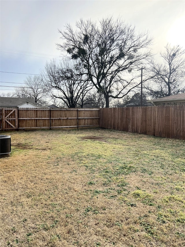 view of yard with central AC