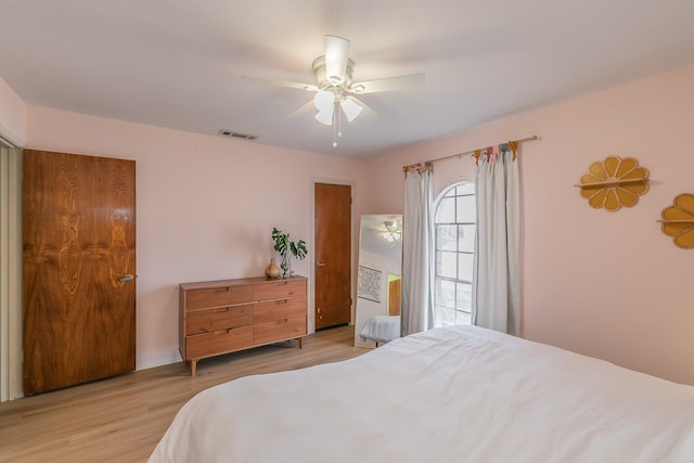 bedroom featuring ceiling fan and light wood-type flooring