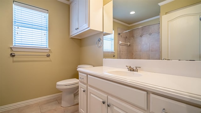 bathroom with crown molding, tile patterned floors, toilet, and vanity