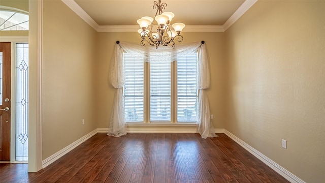 interior space with crown molding, dark wood-type flooring, and an inviting chandelier