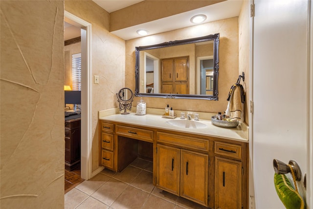 bathroom featuring tile patterned floors and vanity