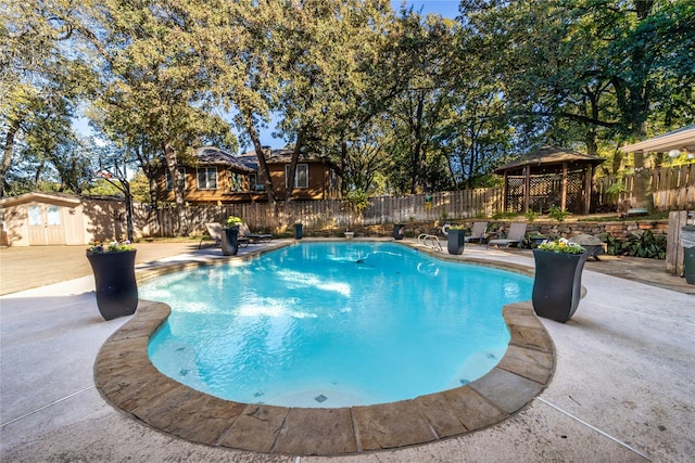 view of pool with a gazebo and a patio area