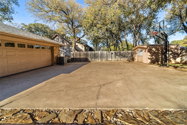 exterior space featuring central AC unit