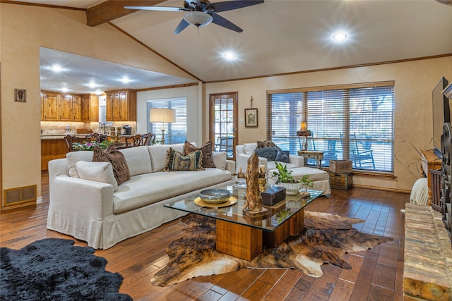 living room with dark hardwood / wood-style flooring, vaulted ceiling with beams, crown molding, and ceiling fan