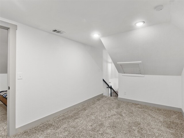 unfurnished bedroom featuring connected bathroom, light hardwood / wood-style flooring, and ceiling fan