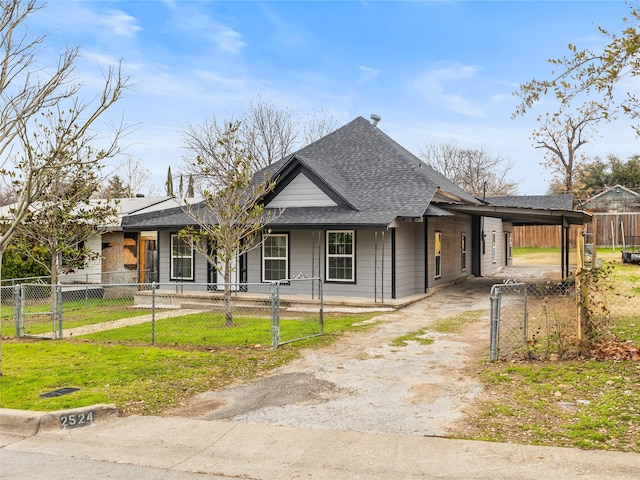 view of front of home with a carport