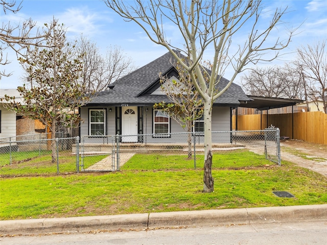 view of front of home featuring a carport and a front lawn