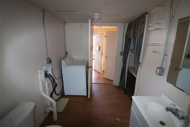 bathroom with vanity, hardwood / wood-style flooring, and toilet