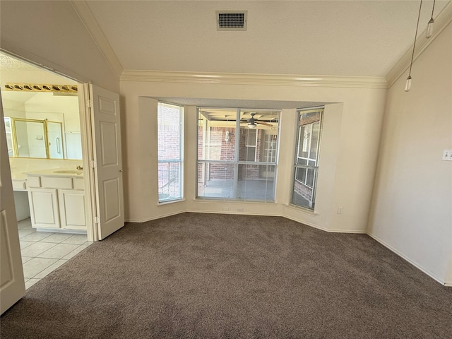 2414 W Stillwater Dr, Mesquite, TX 75181 - spare room featuring ornamental molding, light colored carpet, a ceiling fan, lofted ceiling, and light tile patterned floors