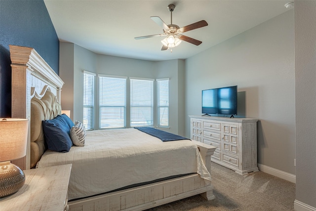 bedroom with light colored carpet and ceiling fan