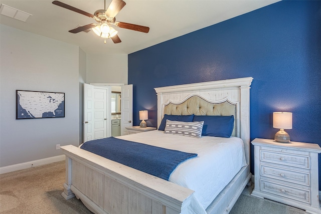 bedroom with light colored carpet and ceiling fan