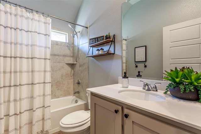 full bathroom featuring vanity, toilet, and shower / bath combo